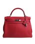 Kelly 32 in Rouge Casaque Taurillion Clemence Leather, front view